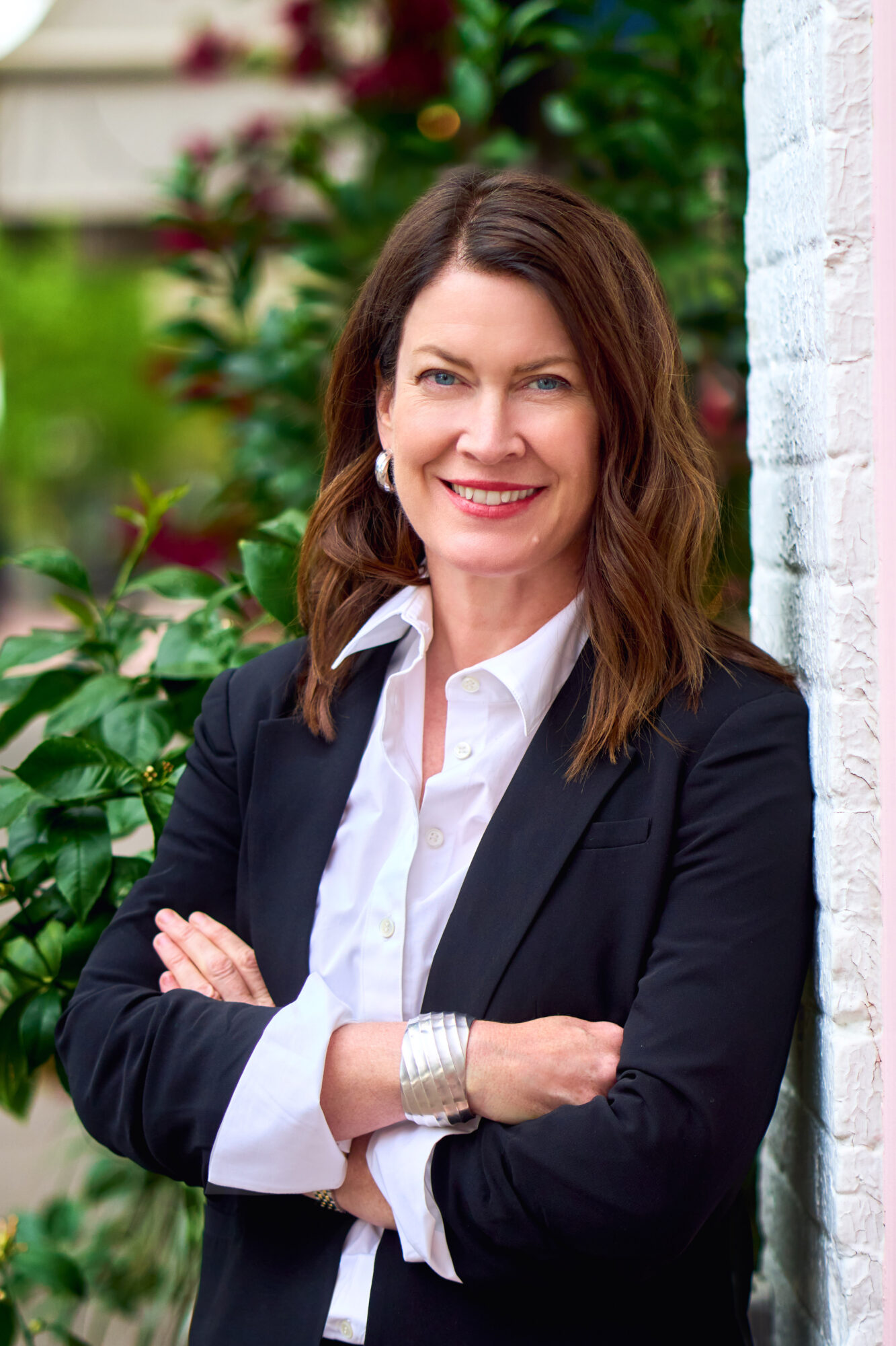 knight kate crop Smiling woman in black blazer outdoors