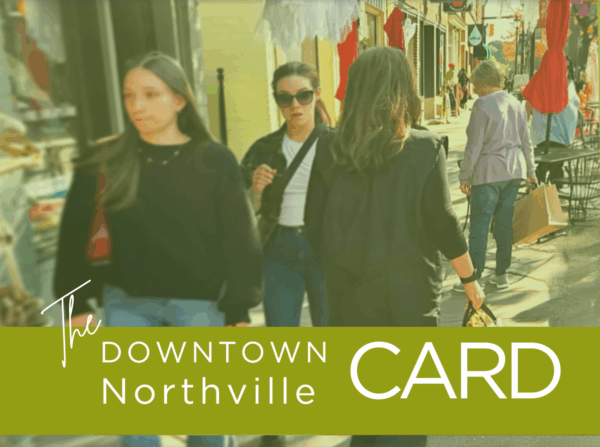 Shoppers in downtown Northville street scene.
